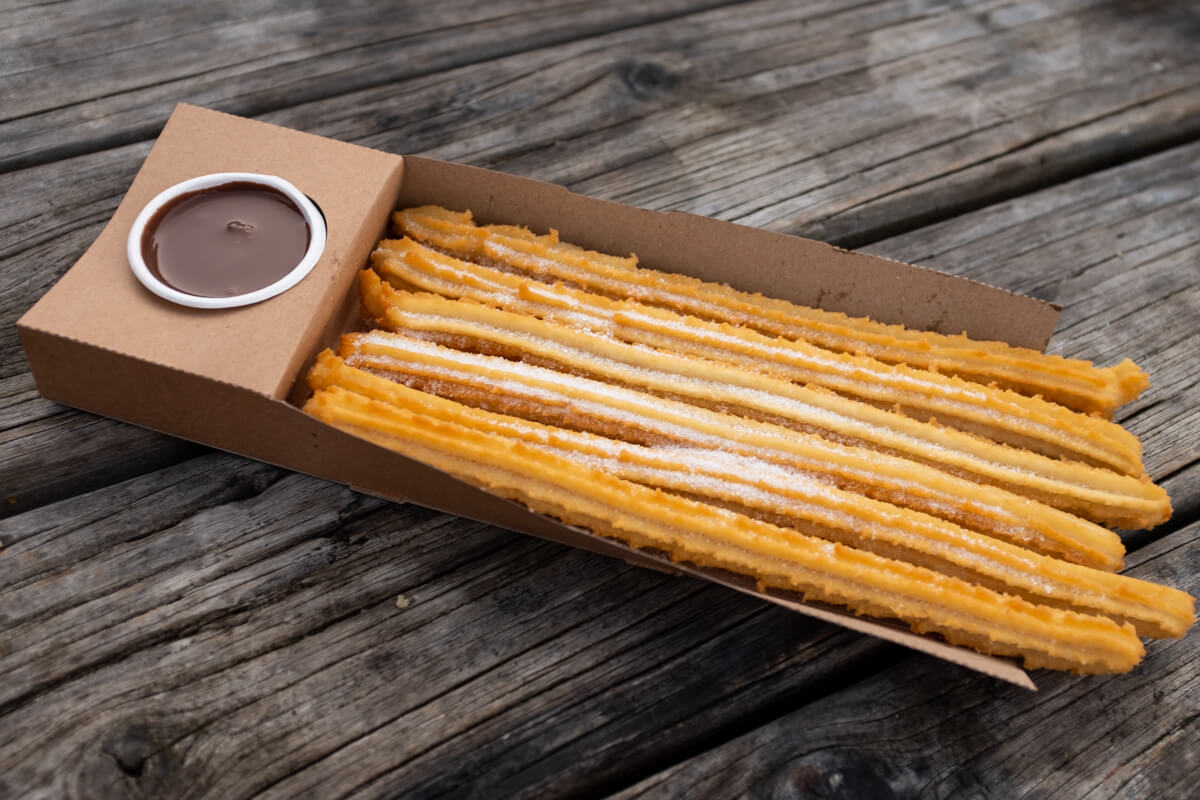 Felafel Bro's crispy, hot churros with rich dark chocolate sauce. Photo: Alex Blackwood.